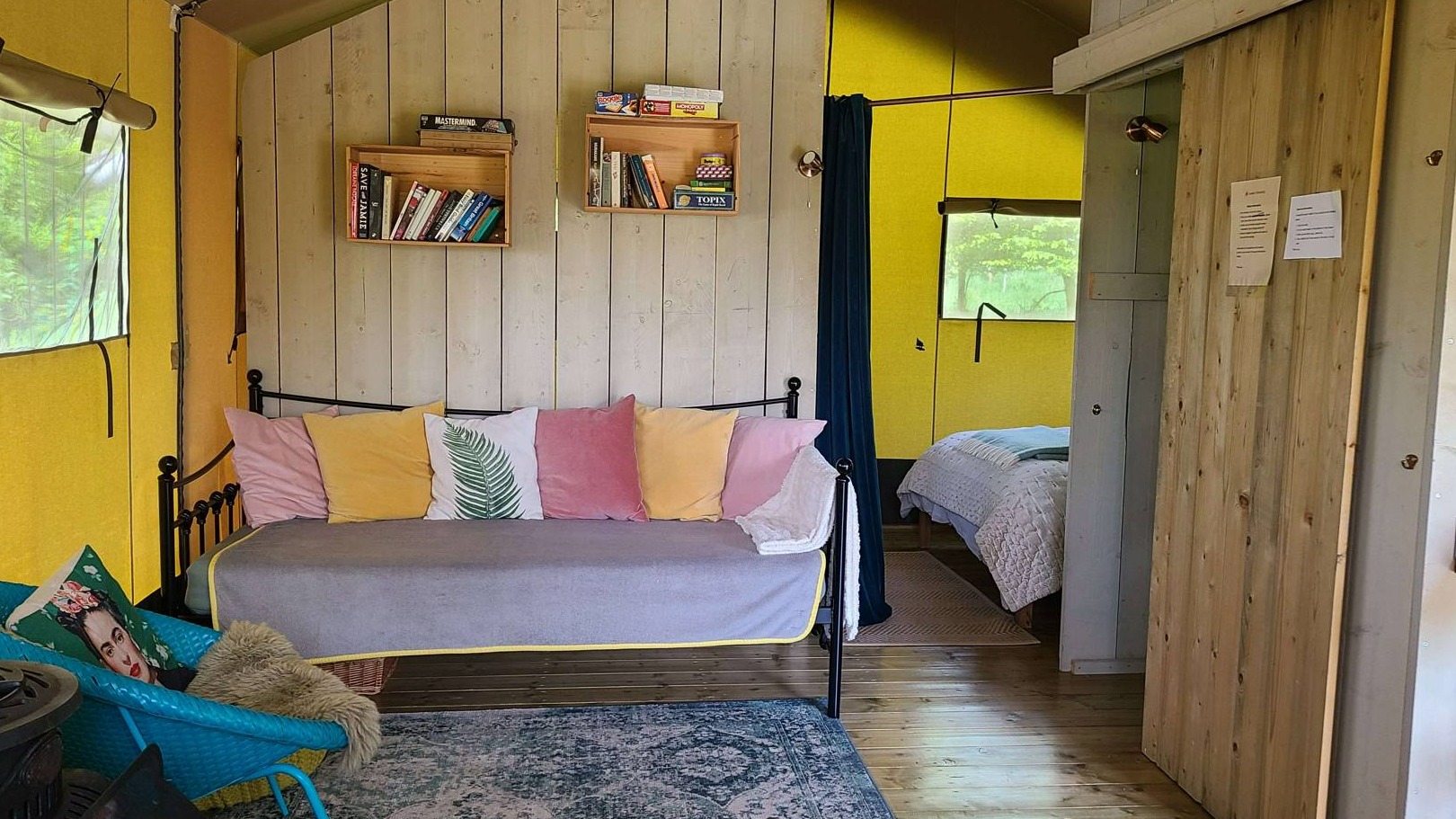 A cosy lounge area inside the safari tent