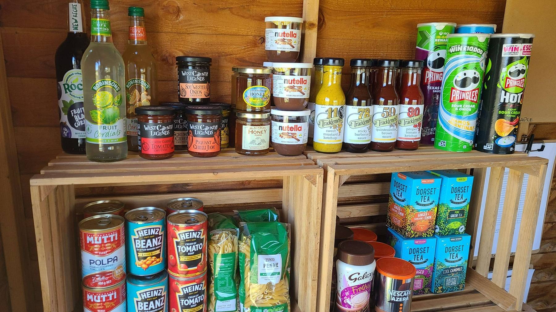 A shelf of items in the honesty shop